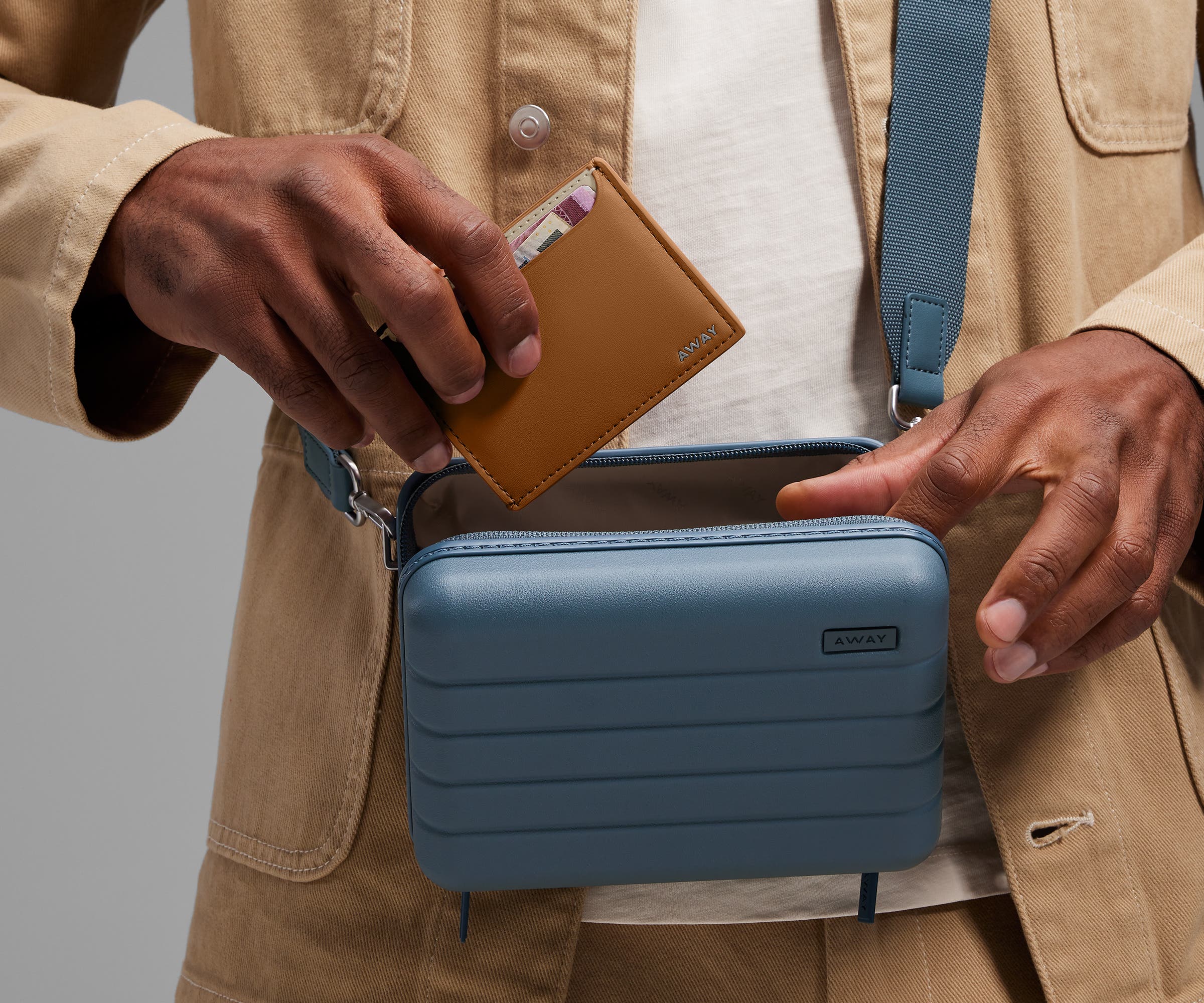 Card case being packed inside The Mini Crossbody