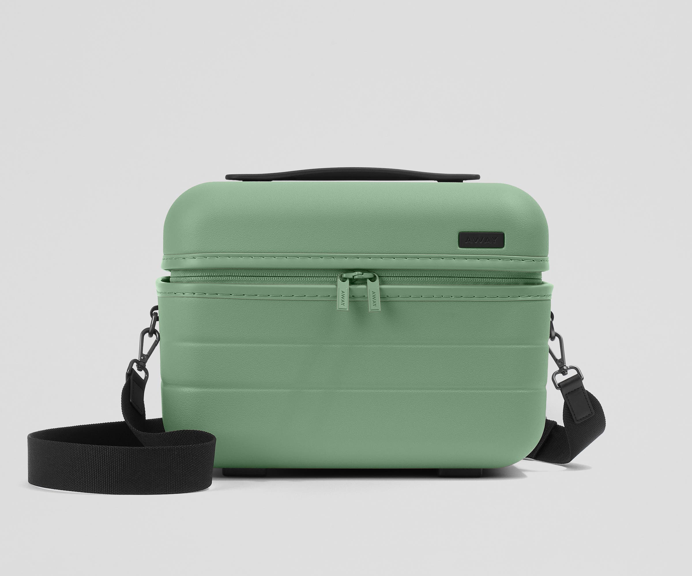 Front view of the Train Case with a detachable shoulder strap