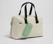 Sunglasses pouch attached to the Everywhere Bag strap