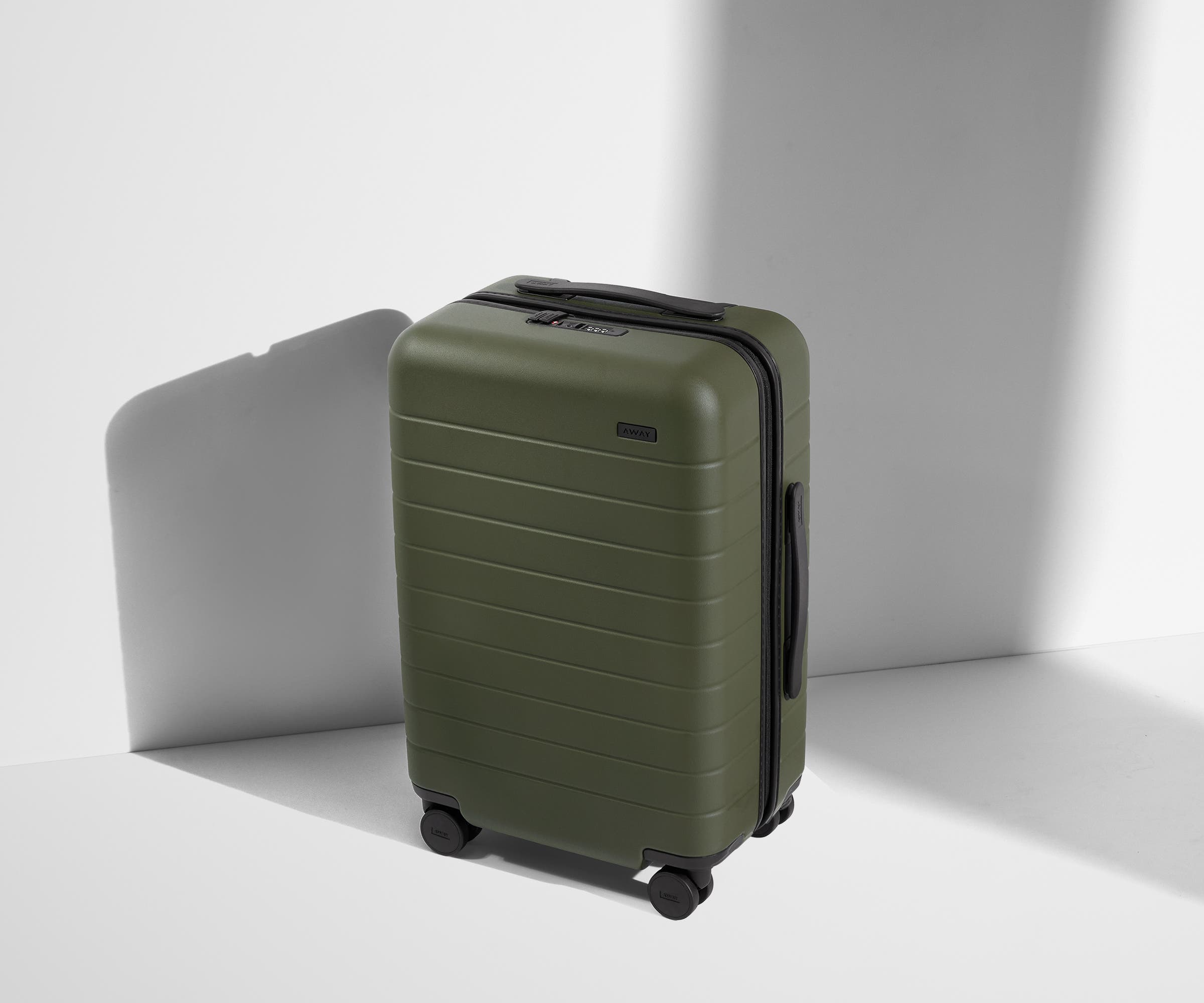 Angled product view of The Carry-On suitcase in Olive Green