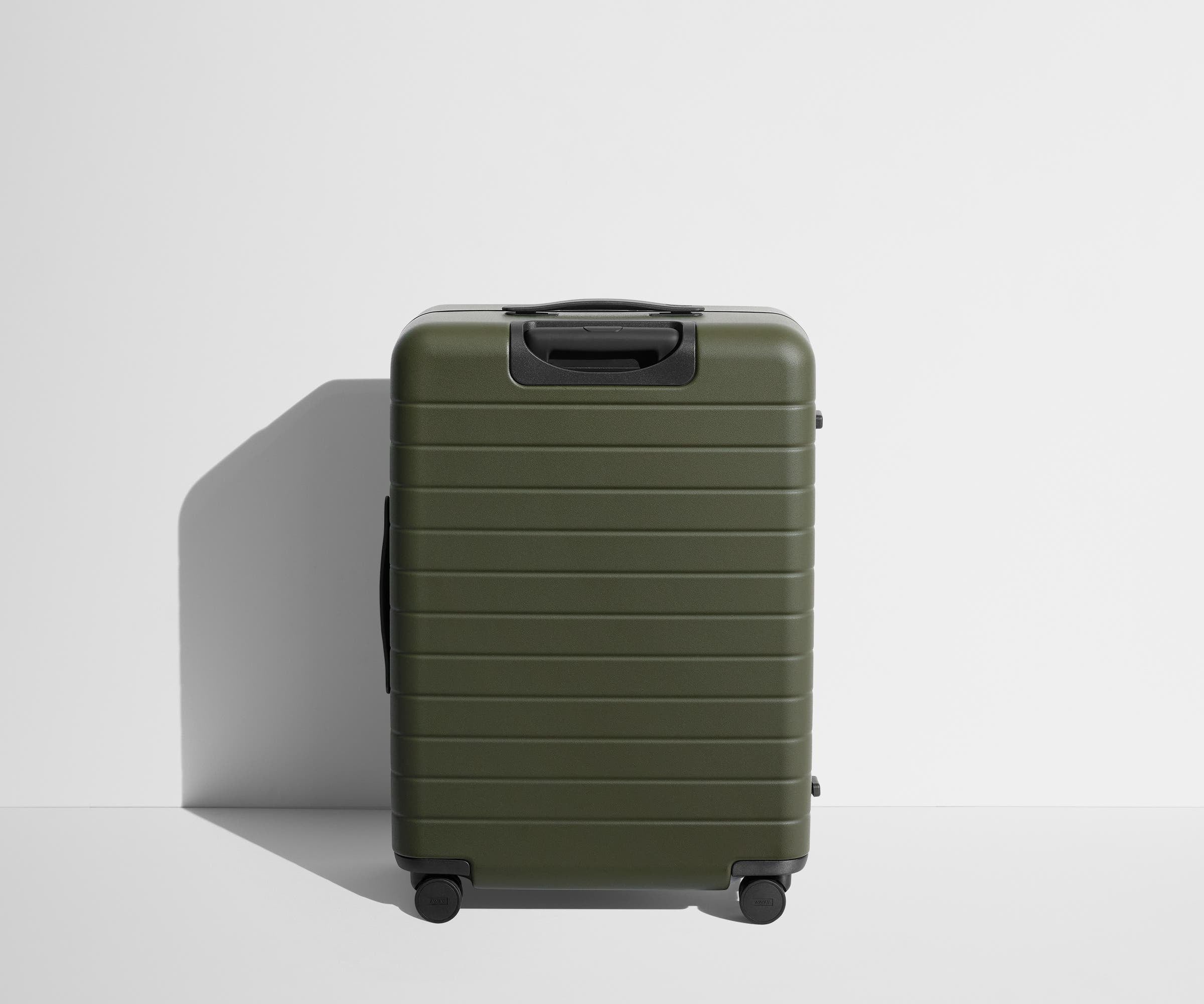 Back product view of The Medium suitcase in Olive Green