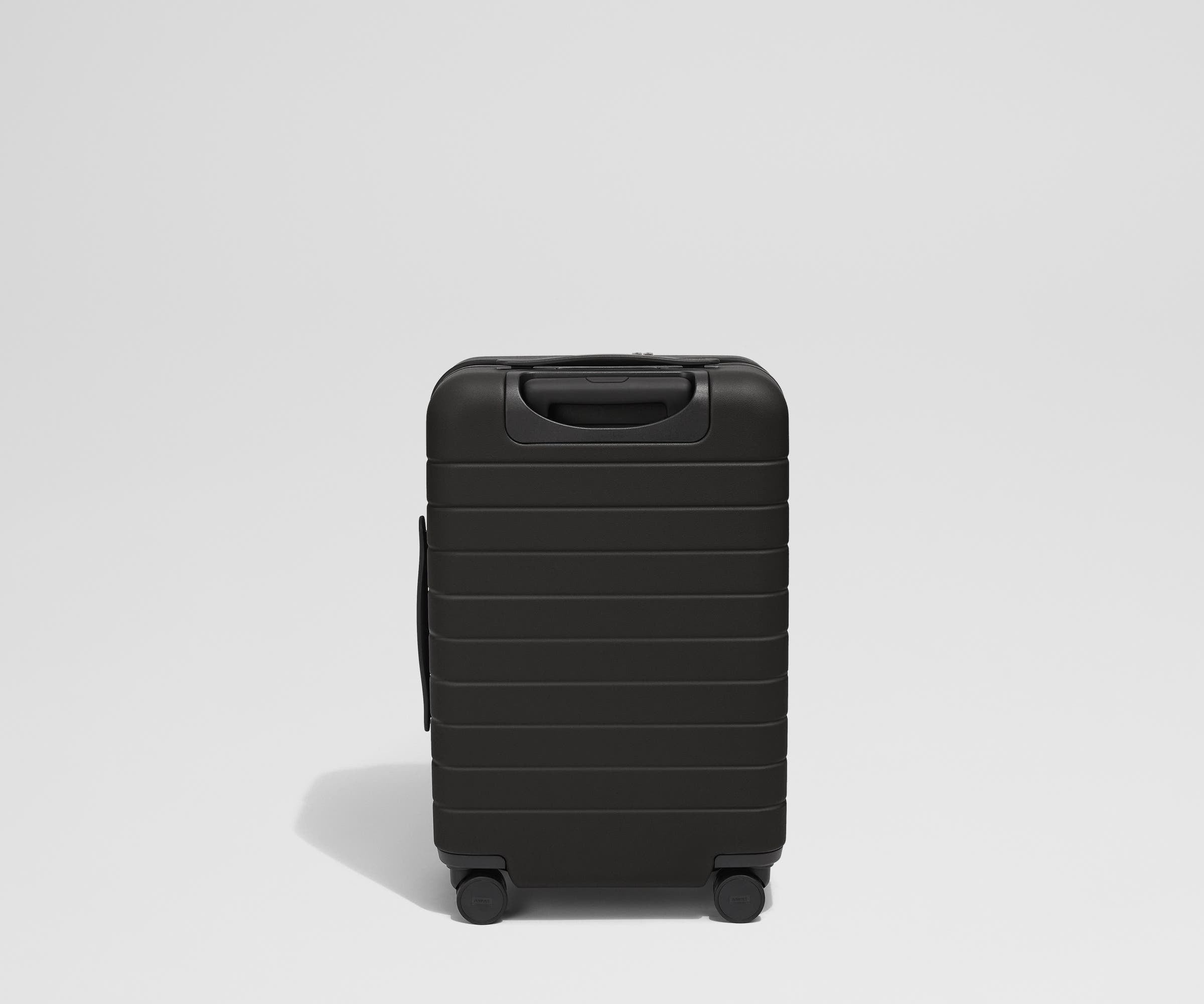 Back product view of The Front Pocket Carry-On suitcase in Jet Black