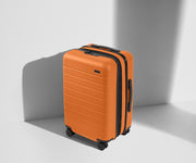 Angled product view of The Carry-On Flex suitcase in Sorbet Orange