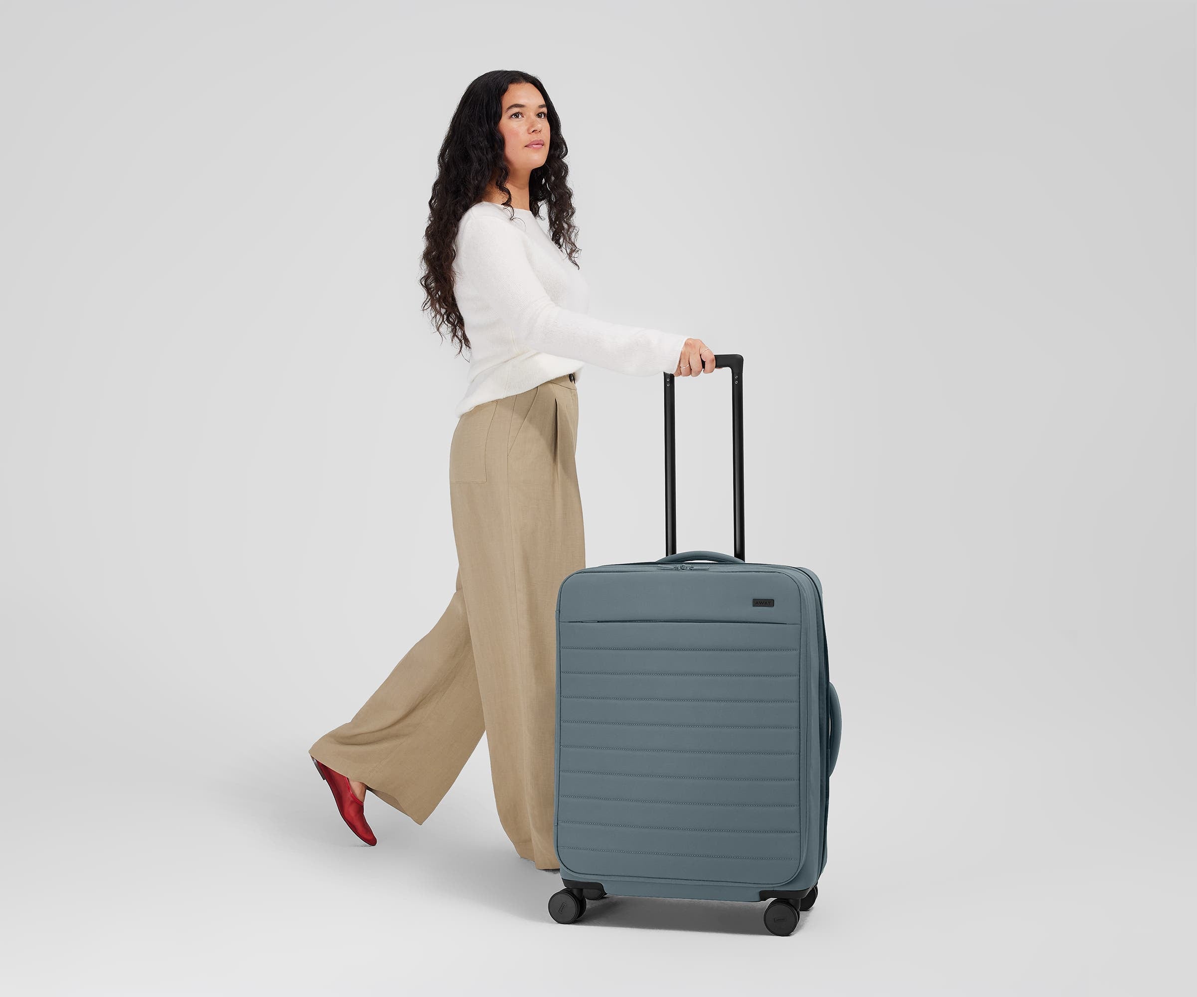 5'7" standing next to the Softside Medium for scale