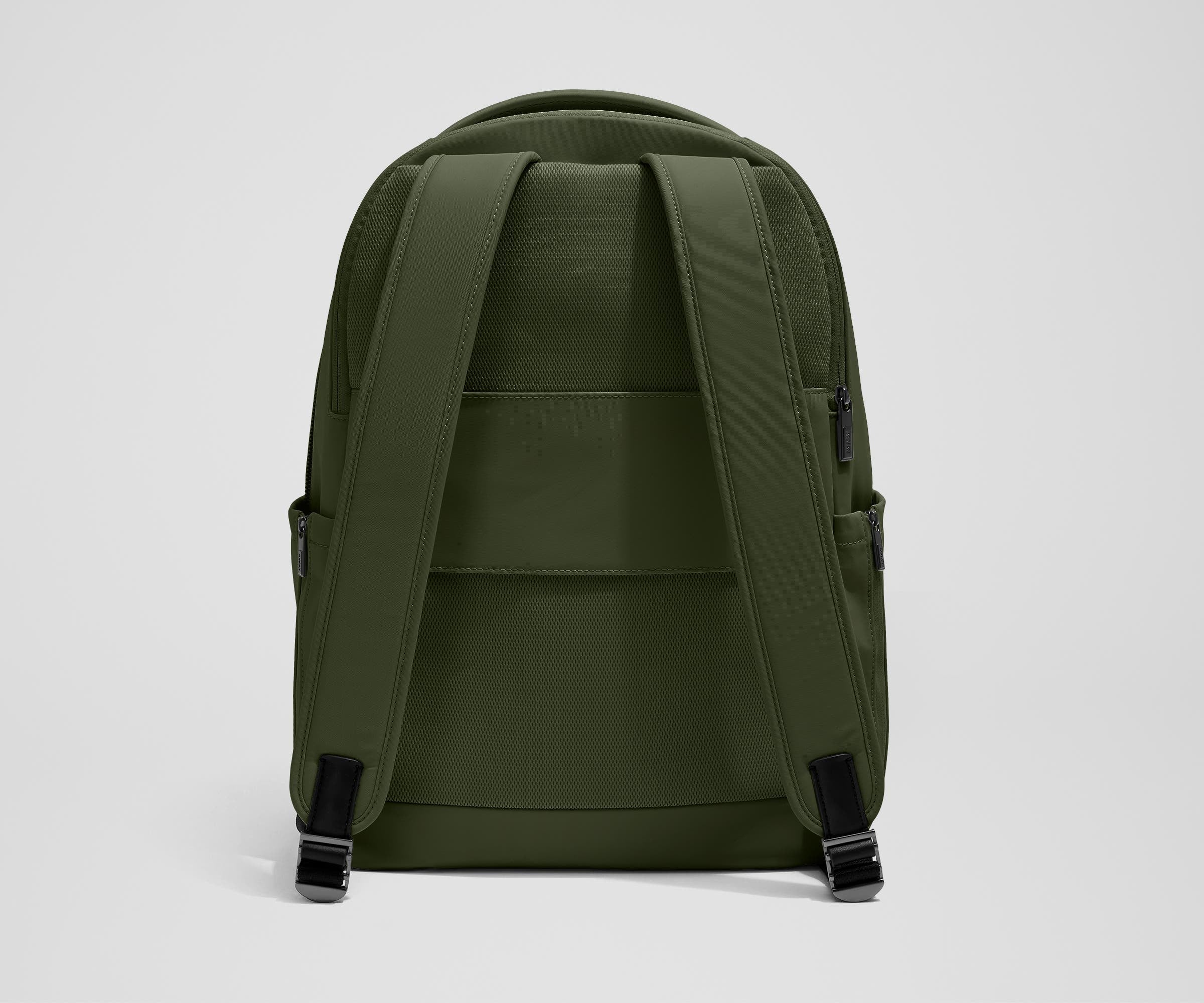 The Commuter Backpack back view showing padded shoulder straps and trolley sleeve feature