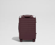 The Aluminum Edge Bigger Carry-On in Oxblood Red