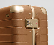 The Aluminum Edge Bigger Carry-On in Cognac Brown