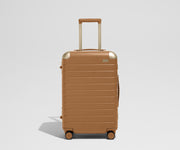 The Aluminum Edge Bigger Carry-On in Cognac Brown