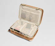 The Aluminum Edge Bigger Carry-On in Cognac Brown