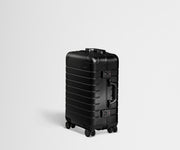 Angled view of an Onyx Black Carry-On Aluminum suitcase