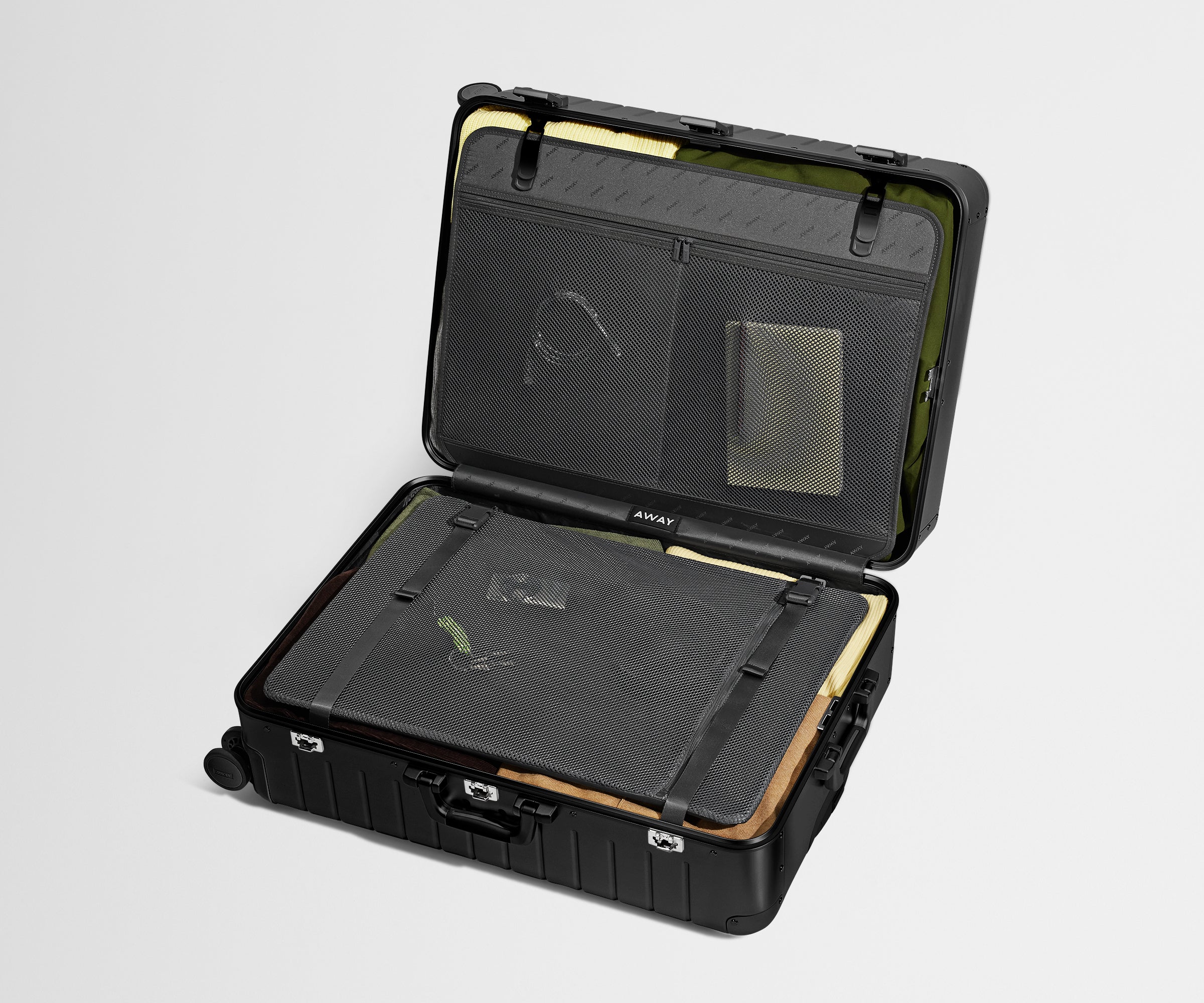 Compression pad and interior organization system of the Large: Aluminum Edition in Onyx Black