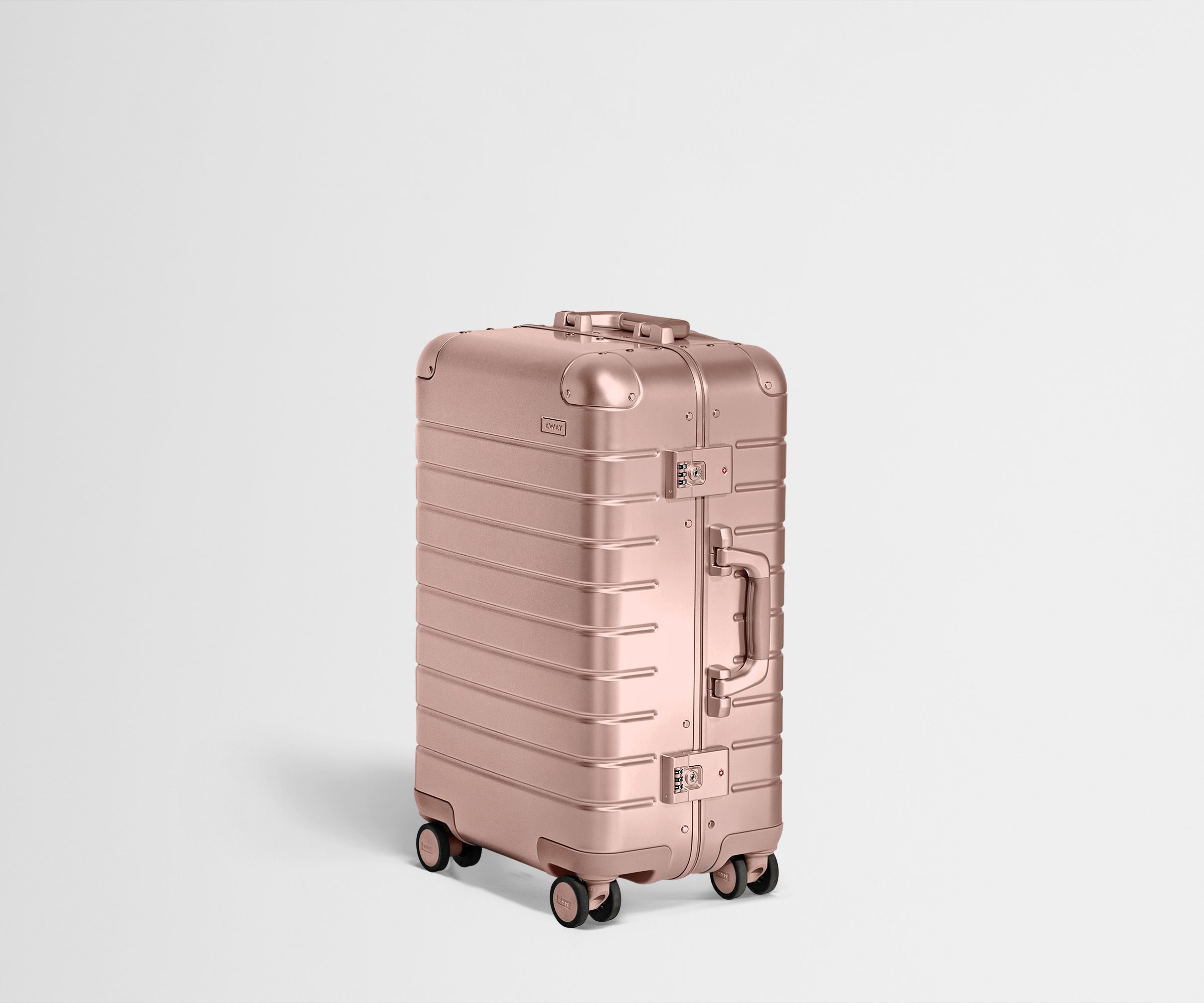 Angled product view of The Bigger Carry-On: Aluminum Edition in Rose Gold