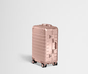 Angled product view of the Rose Gold Aluminum Carry-On