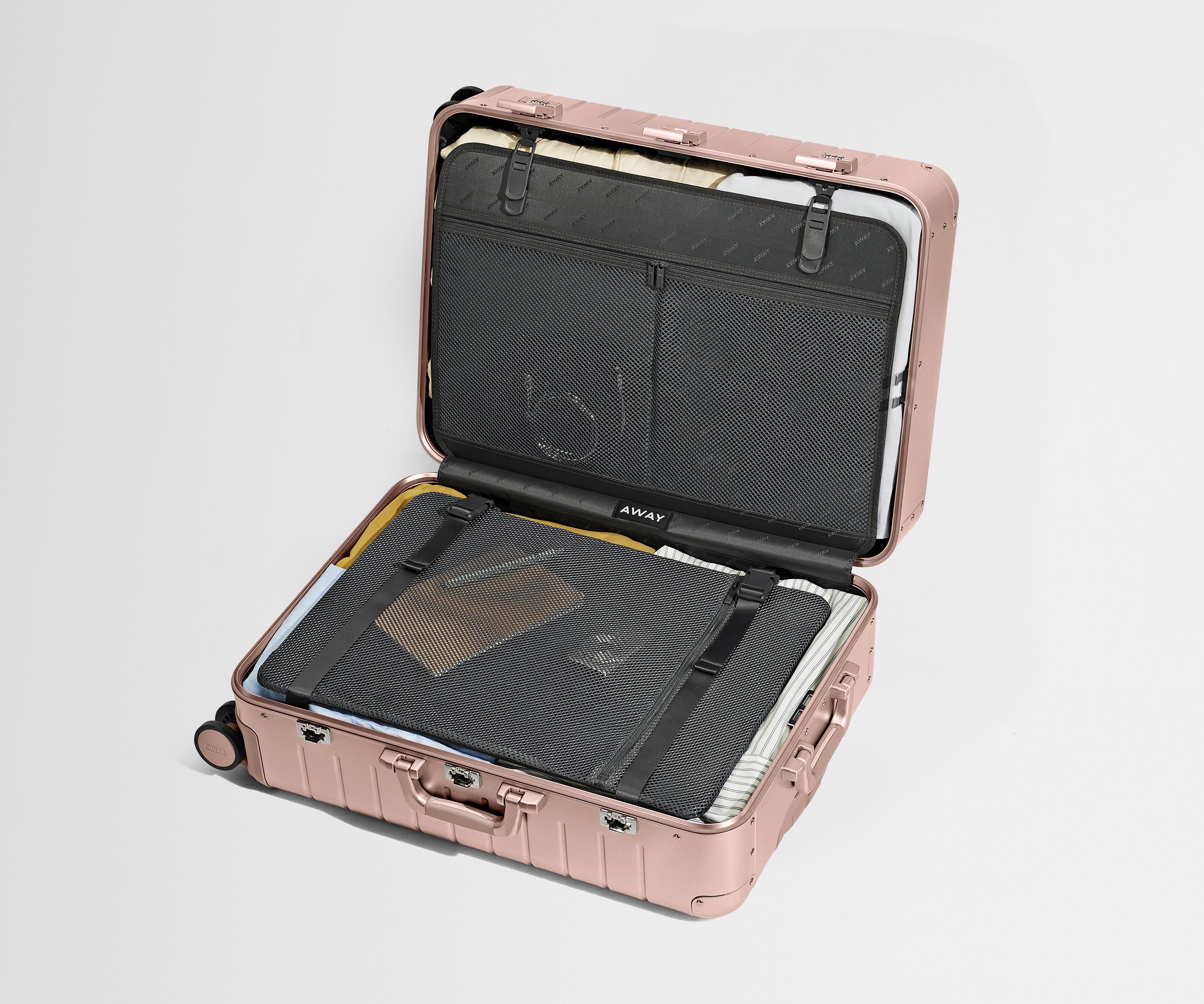 Compression pad and interior organization system of the Medium: Aluminum Edition in Rose Gold