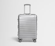 Front view of the Medium: Aluminum suitcase in Silver with handles raised