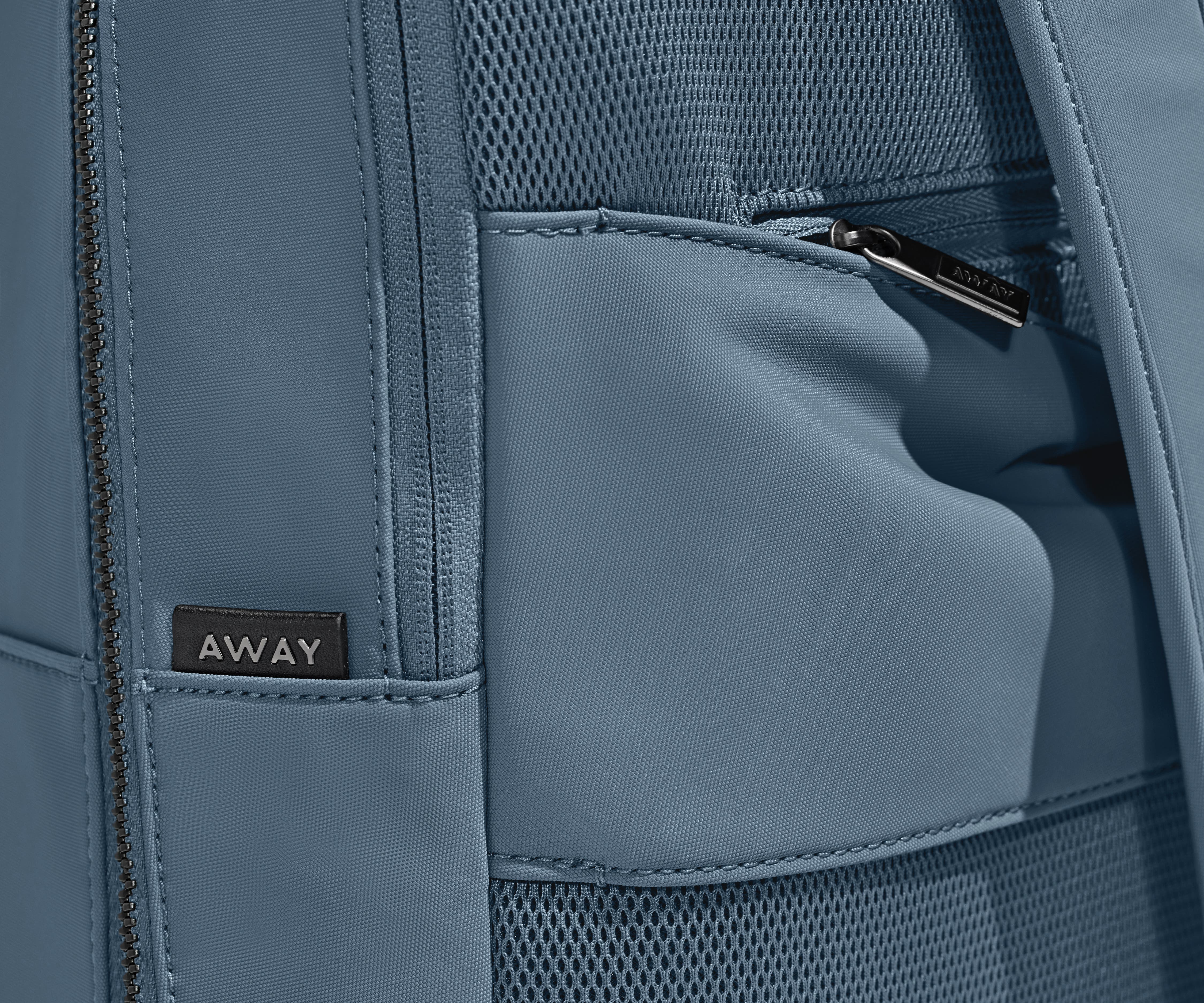 Close up view of the trolley sleeve and hidden back pocket
