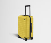 Angled product view of The Carry-On suitcase in Sunshine Yellow