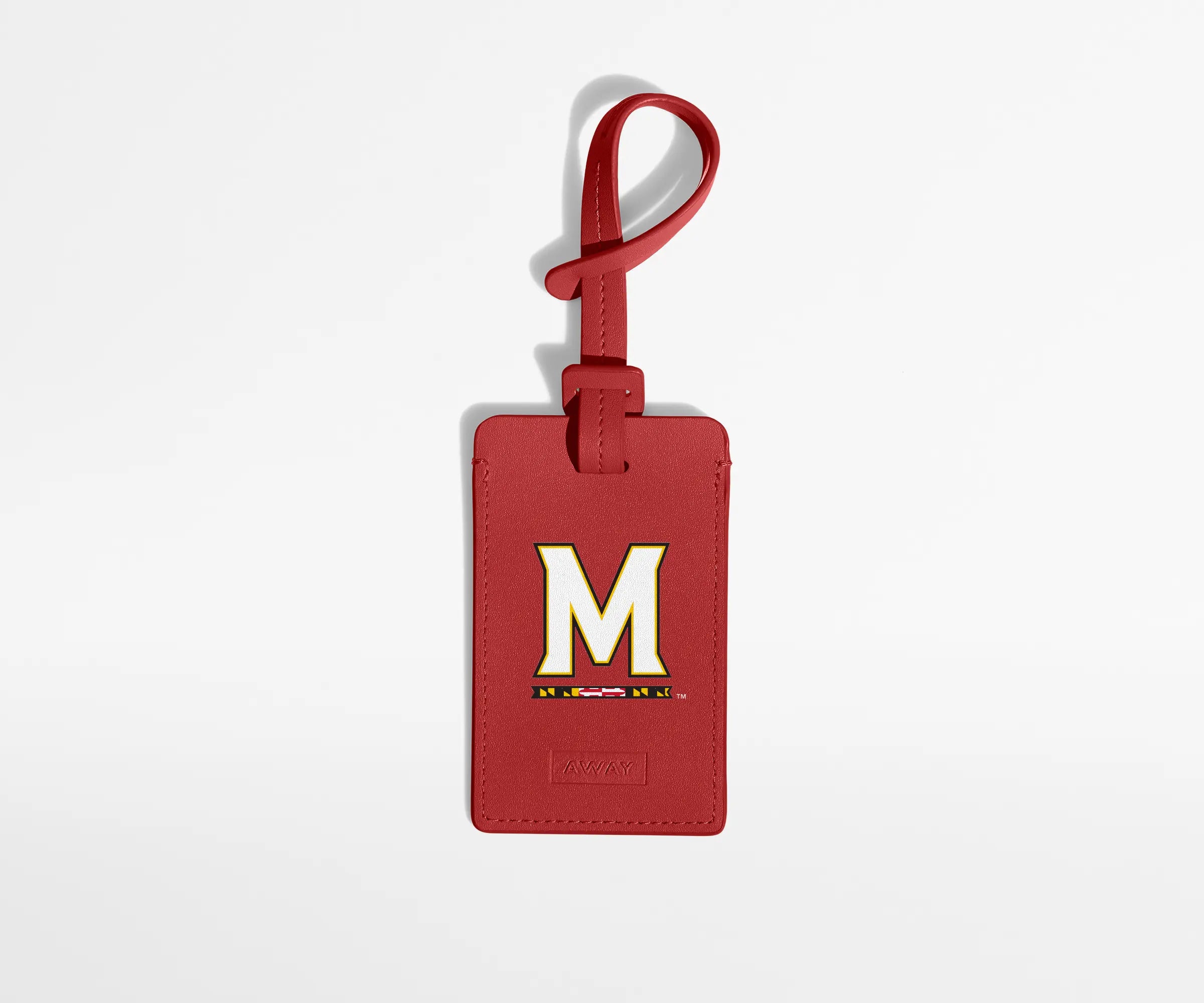 Red luggage tag with the University of Maryland logo on it.
