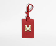Red luggage tag with the University of Maryland logo on it.