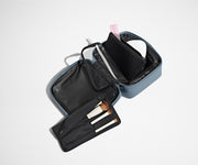 Cosmetics Bag packed with make up and shown with the detachable make up roll