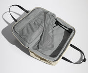 Open, unpacked Weekender Bag showing the mesh compartments and pockets