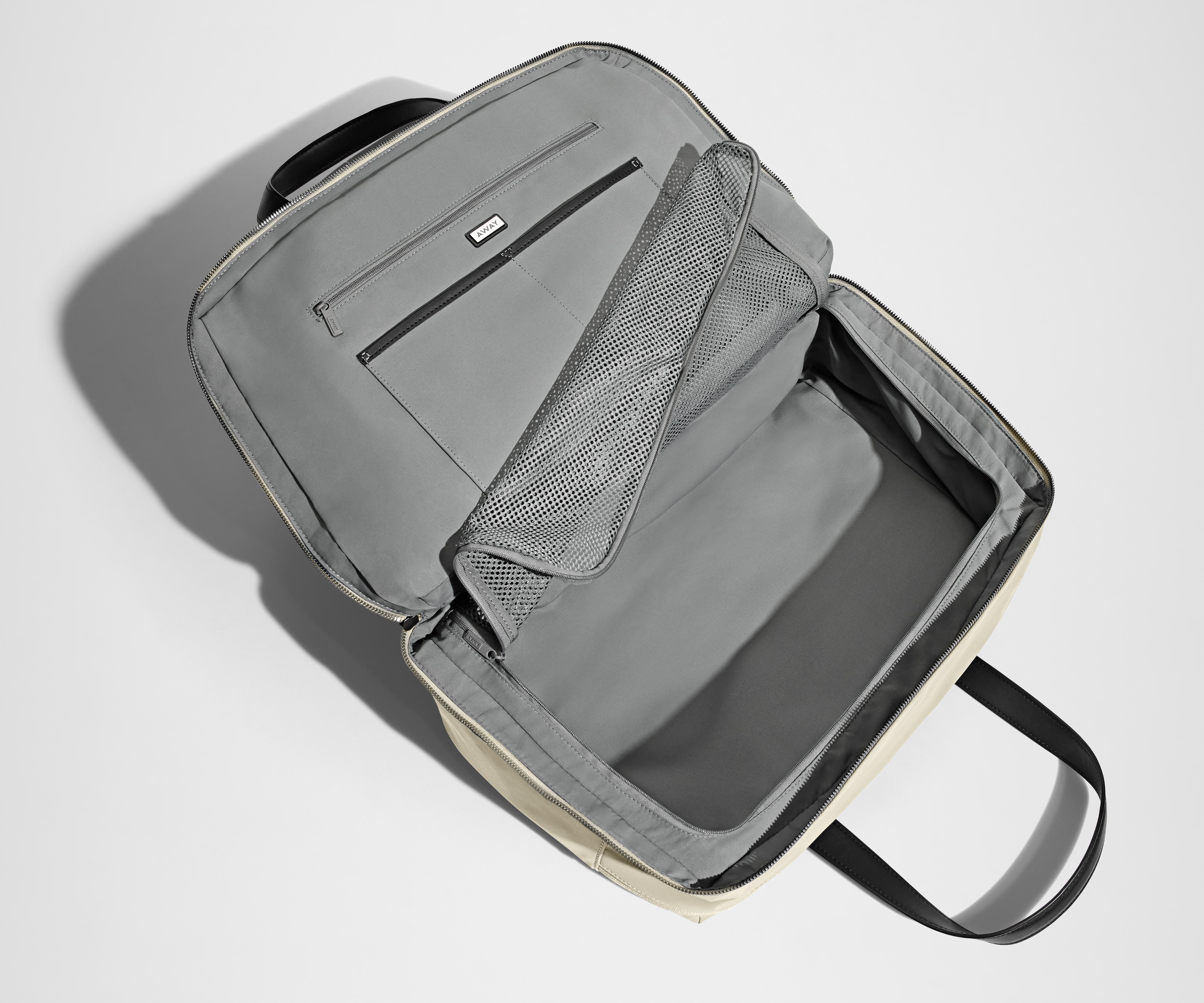 Empty Overnight Bag showing the clamshell opening and depth of the main compartment
