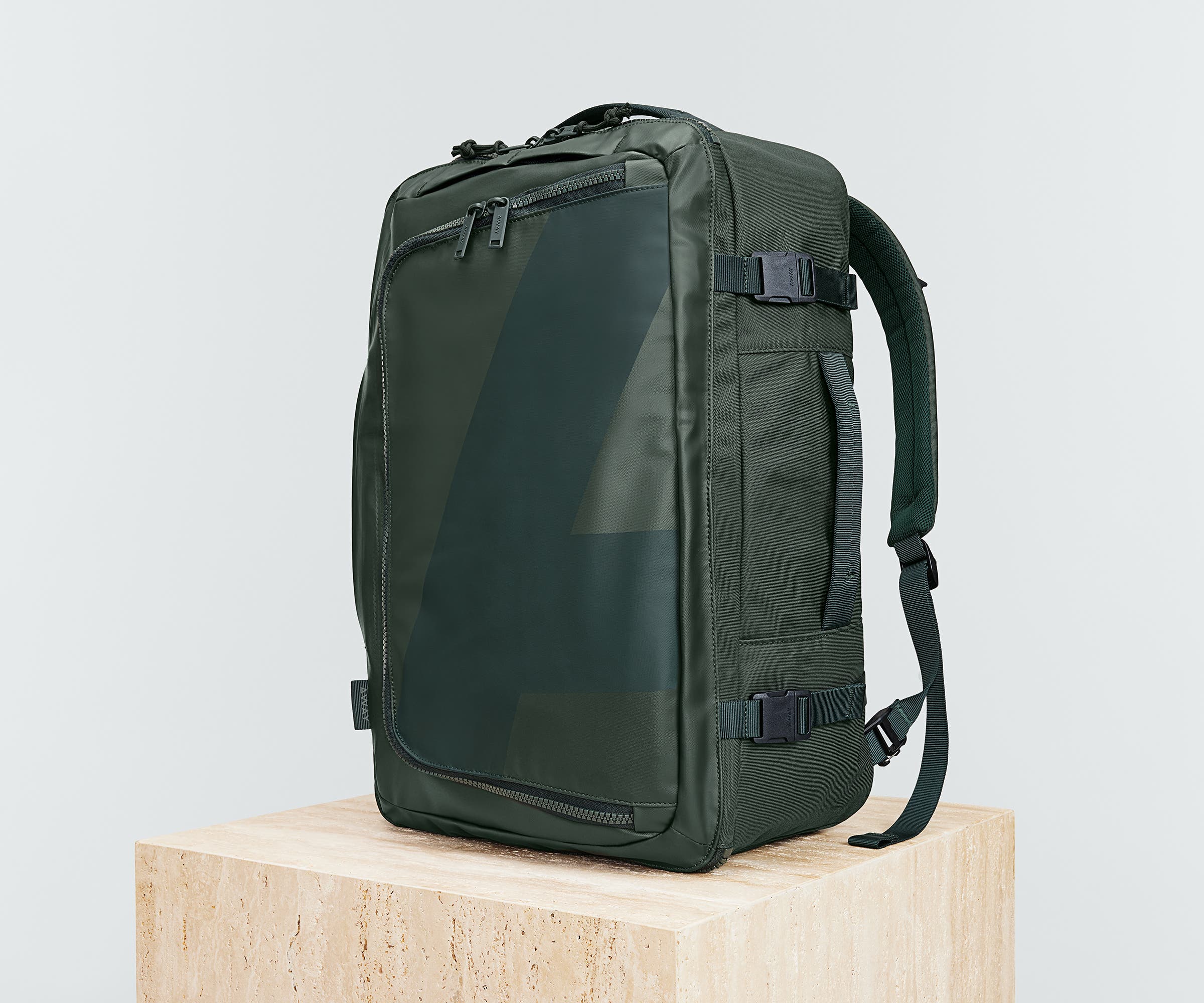 Angled view of the 45L Convertible Backpack, showing the compression straps and side grab handles