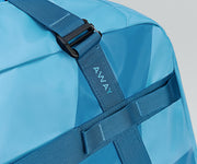 Close up view of the abrasion-resistant material and Away logo