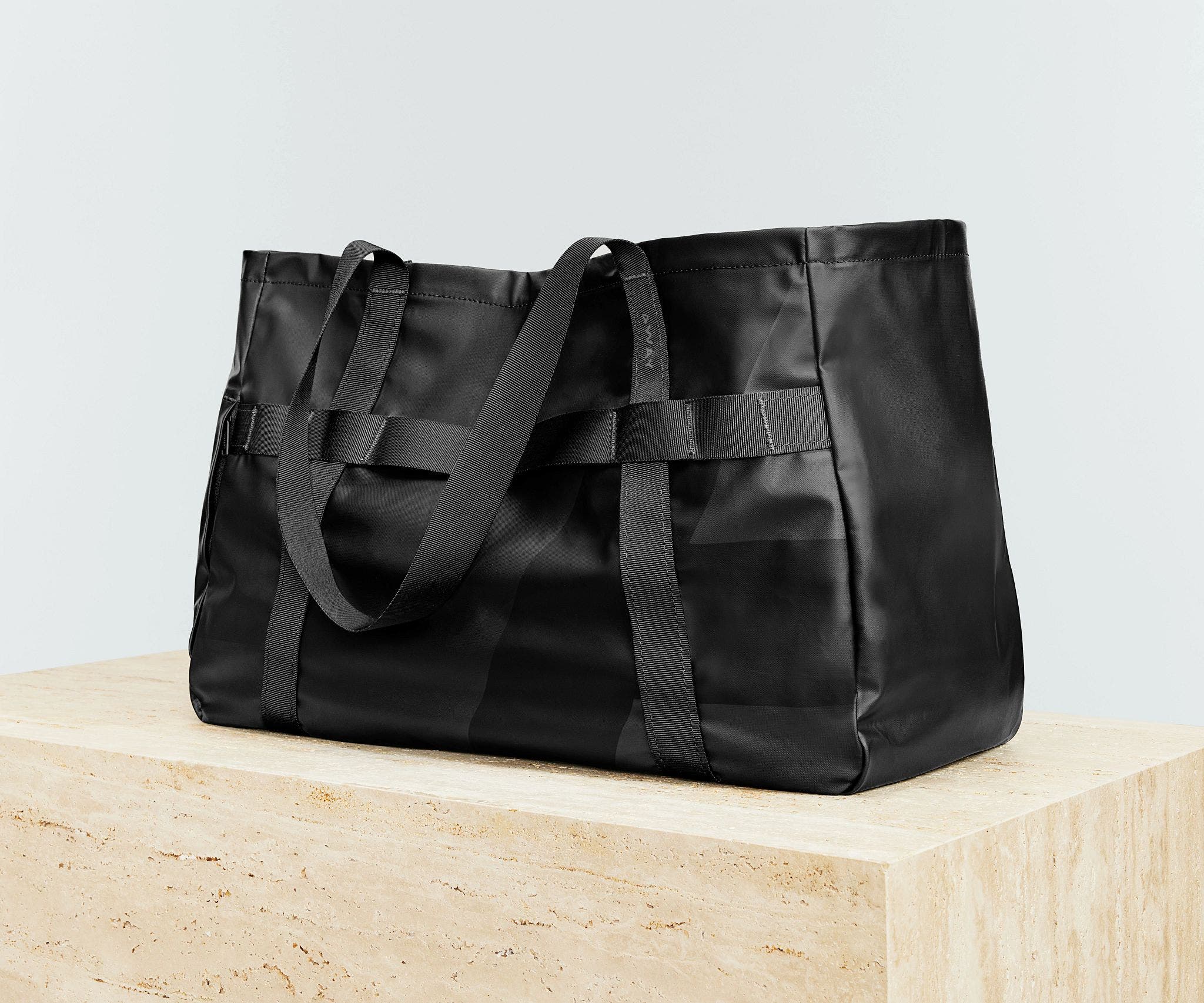 Angled view of the Active Tote 45L with the handles down