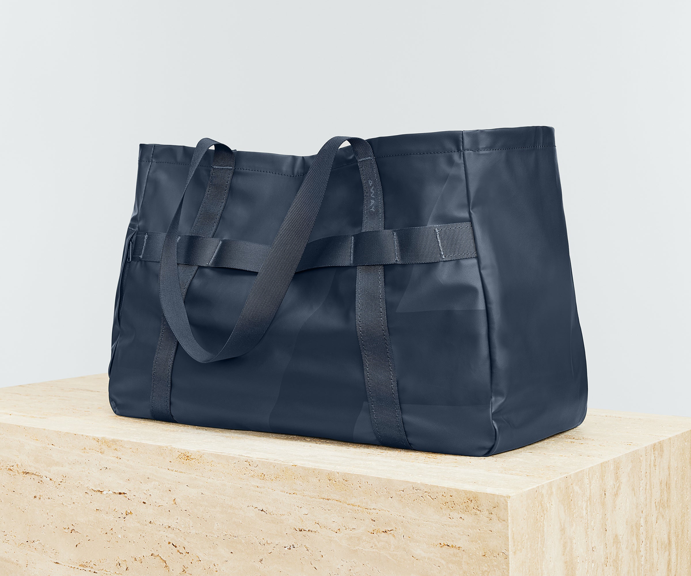 Angled view of the Active Tote 45L with the handles down