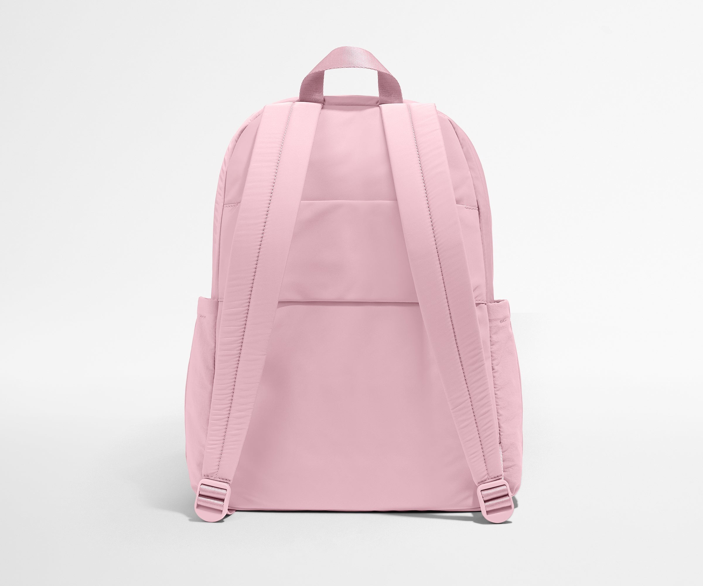 Pink backpack on a light gray background