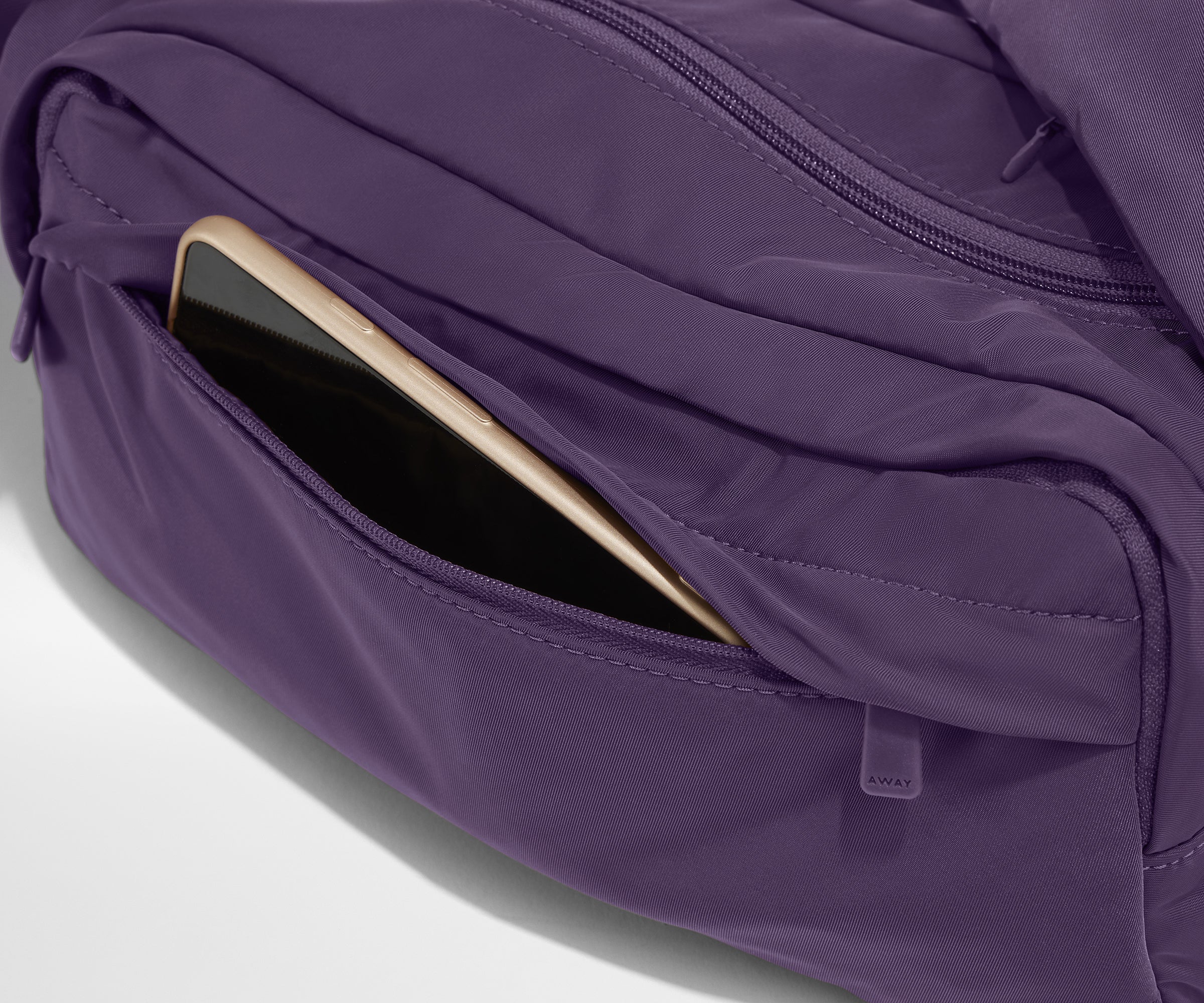 Phone packed in the front zip pocket