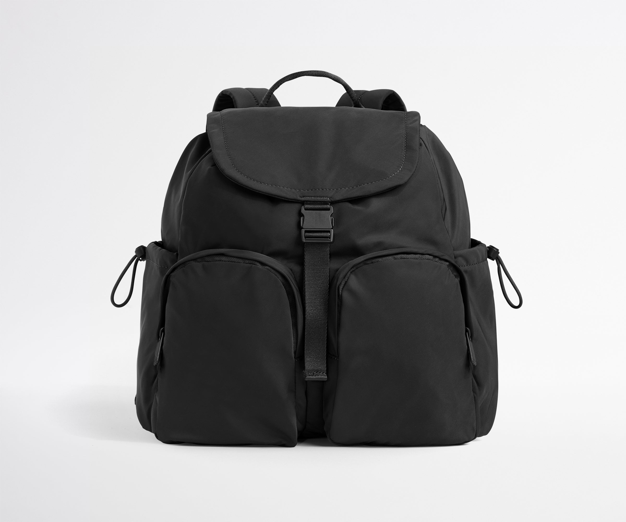 Black backpack on a light gray background