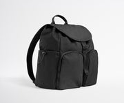 Black backpack on a light gray background
