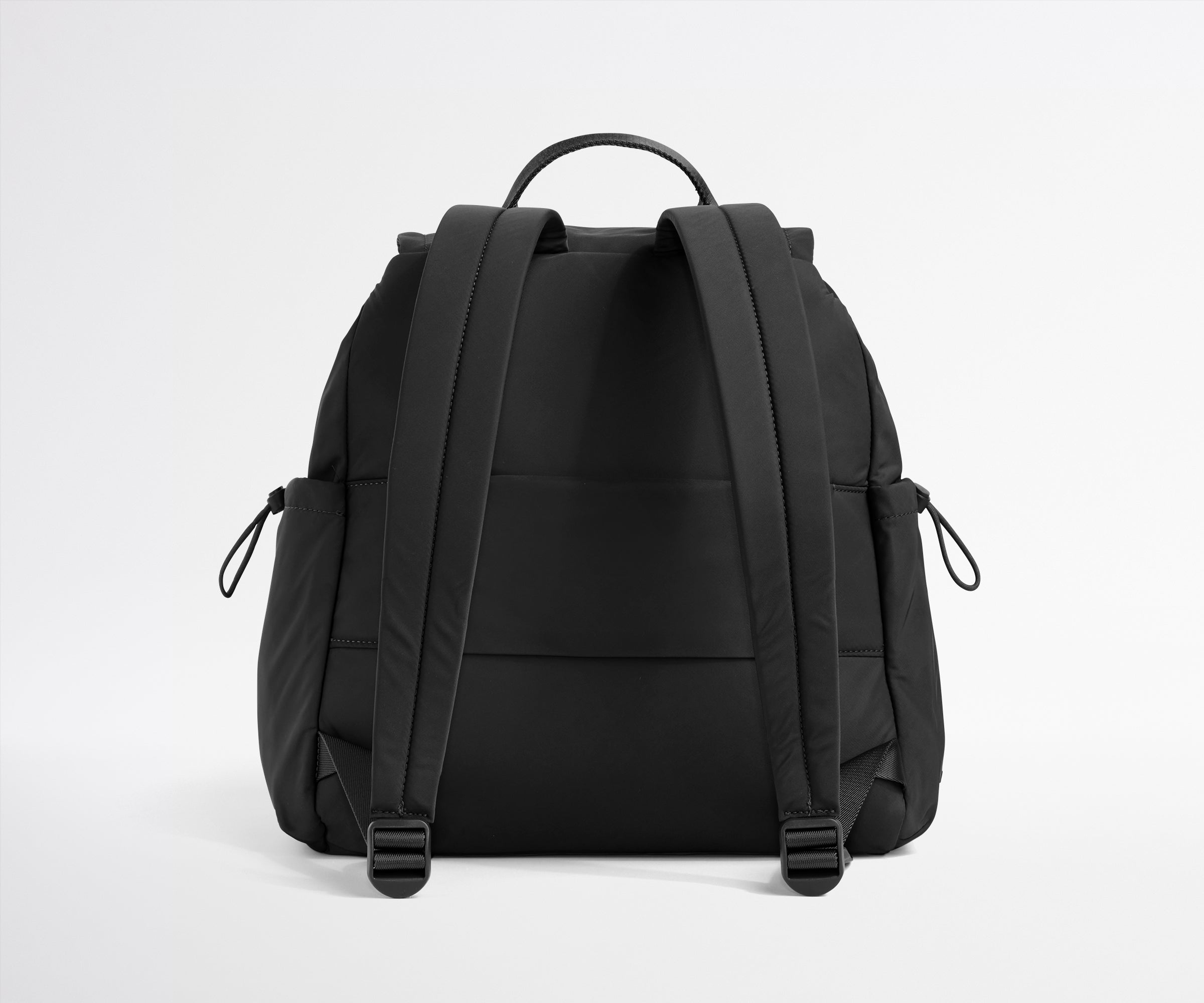 Black backpack on a light gray background