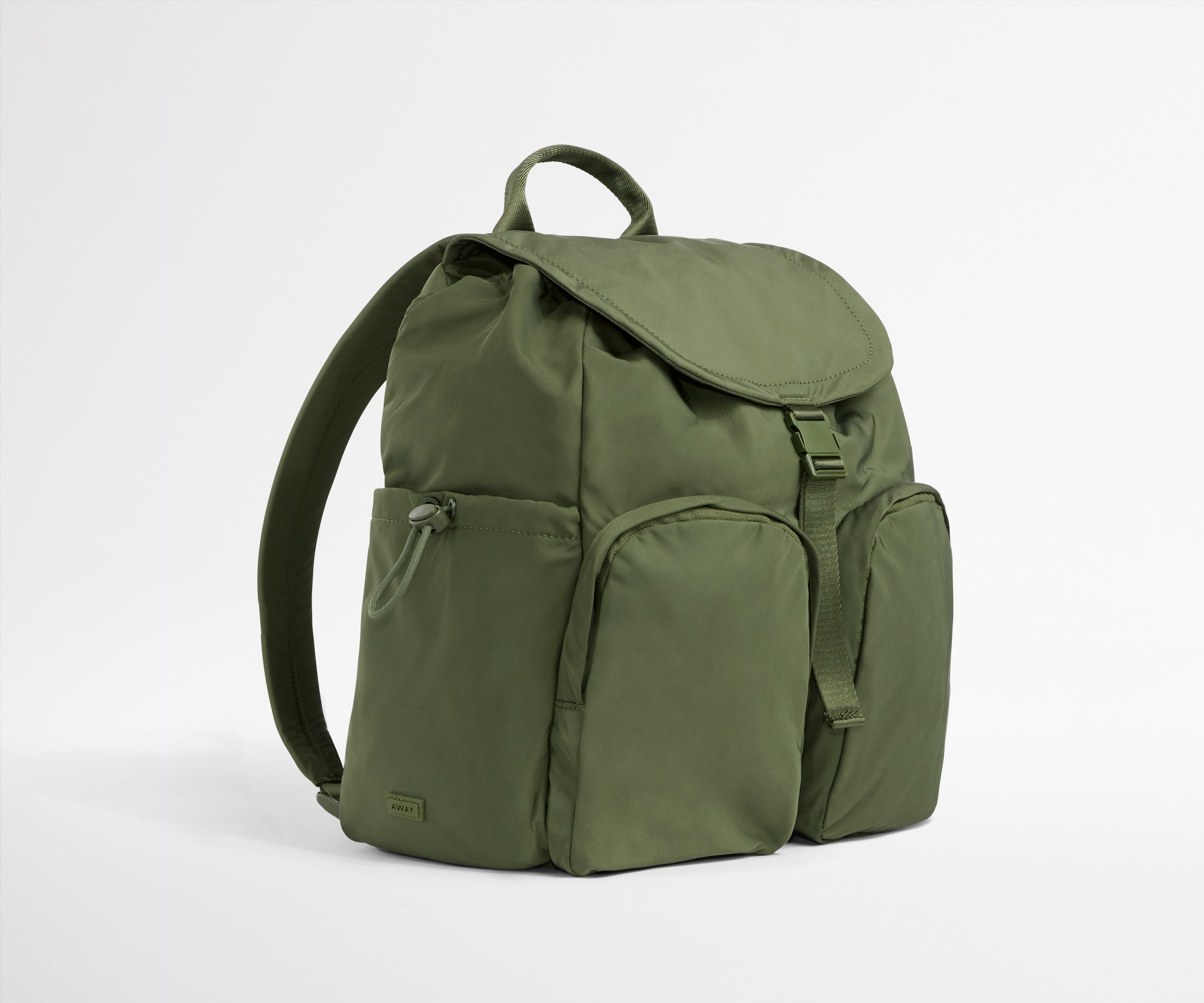 Green backpack on a white background