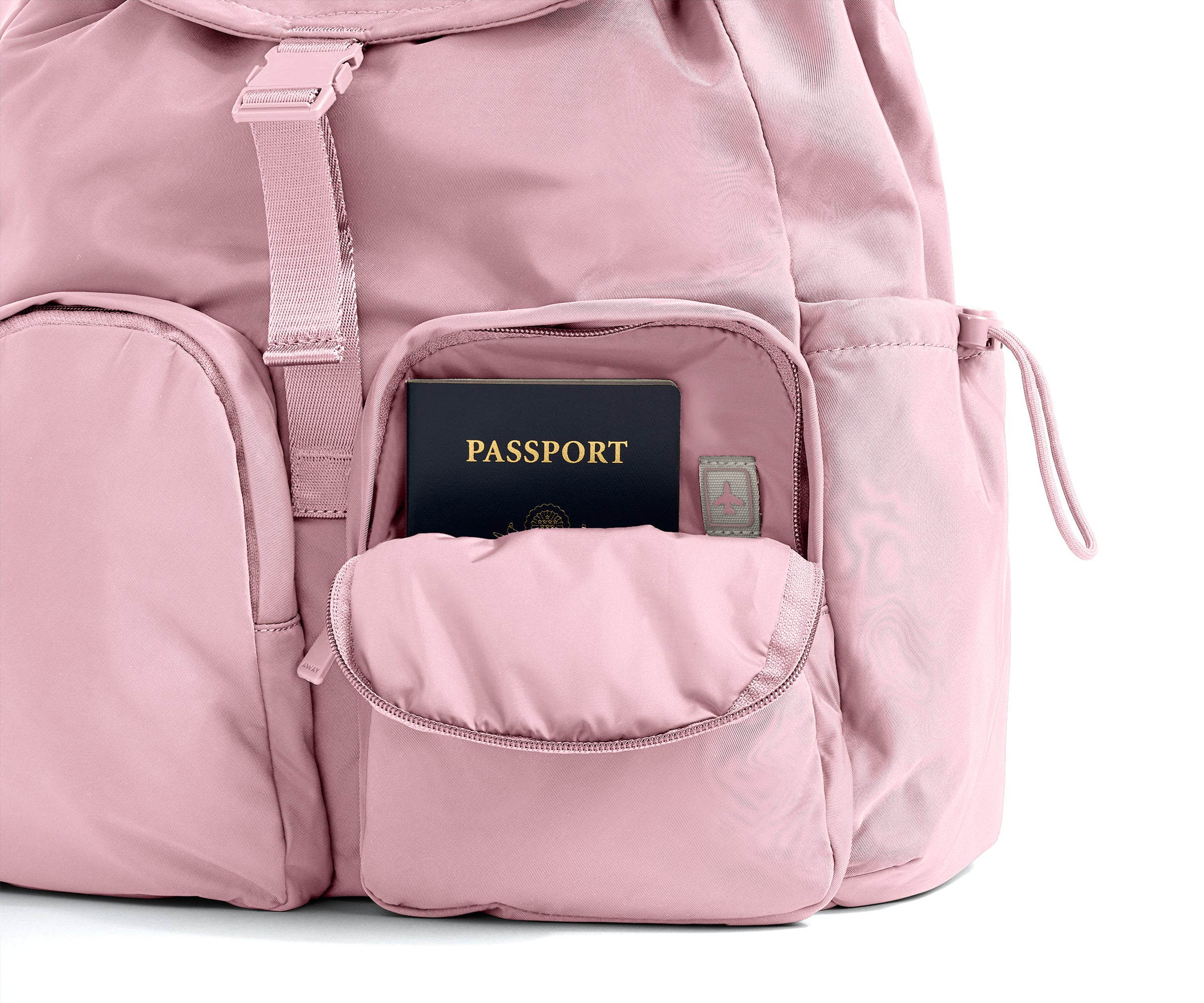 Pink backpack with a passport in an open pocket on a white background
