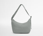 Gray shoulder bag on a light gray background