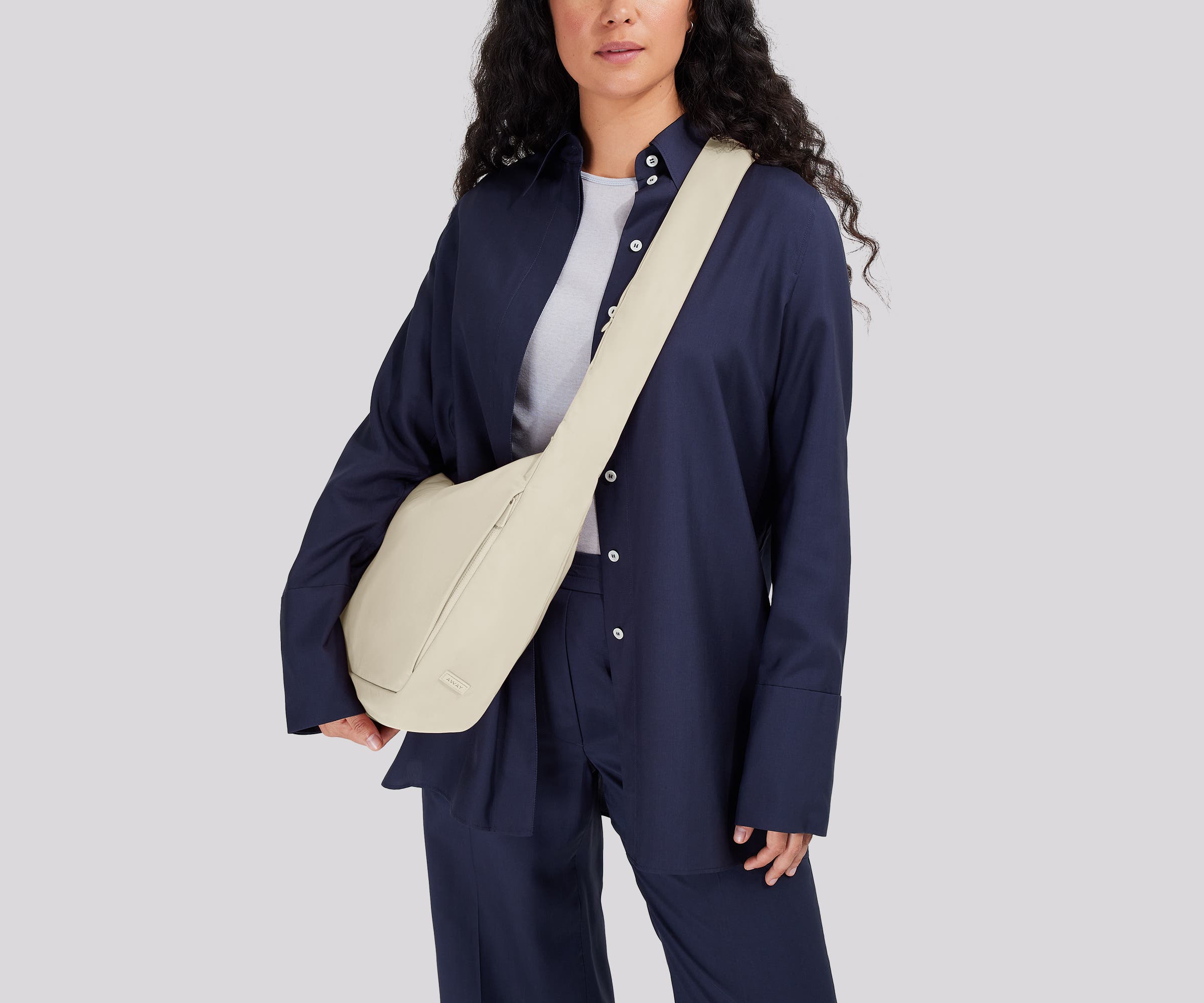 Person wearing the Featherlight Crossbody