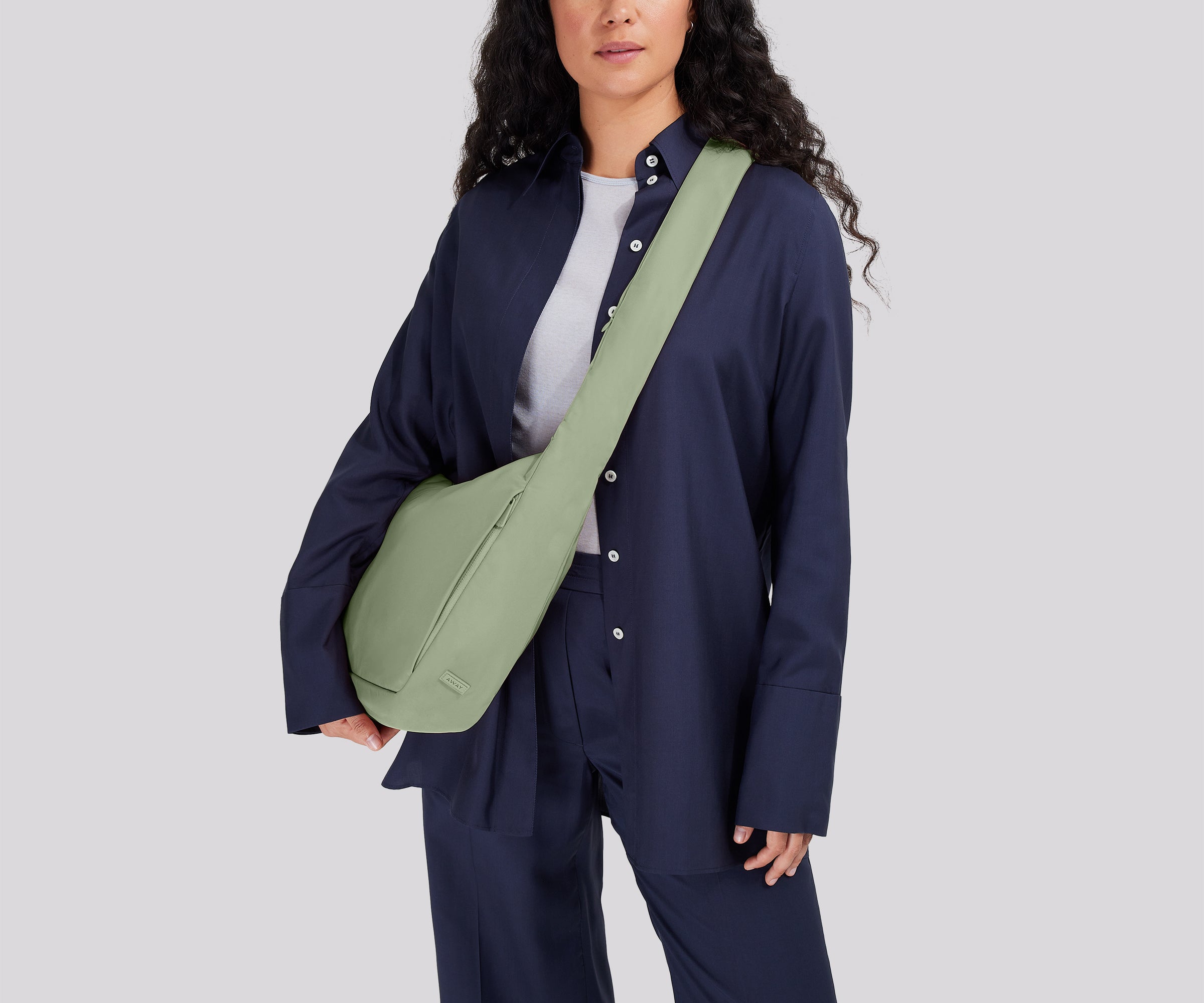 Person wearing the Featherlight Crossbody
