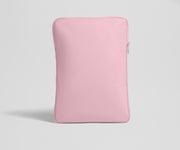Pink laptop sleeve on a light gray background
