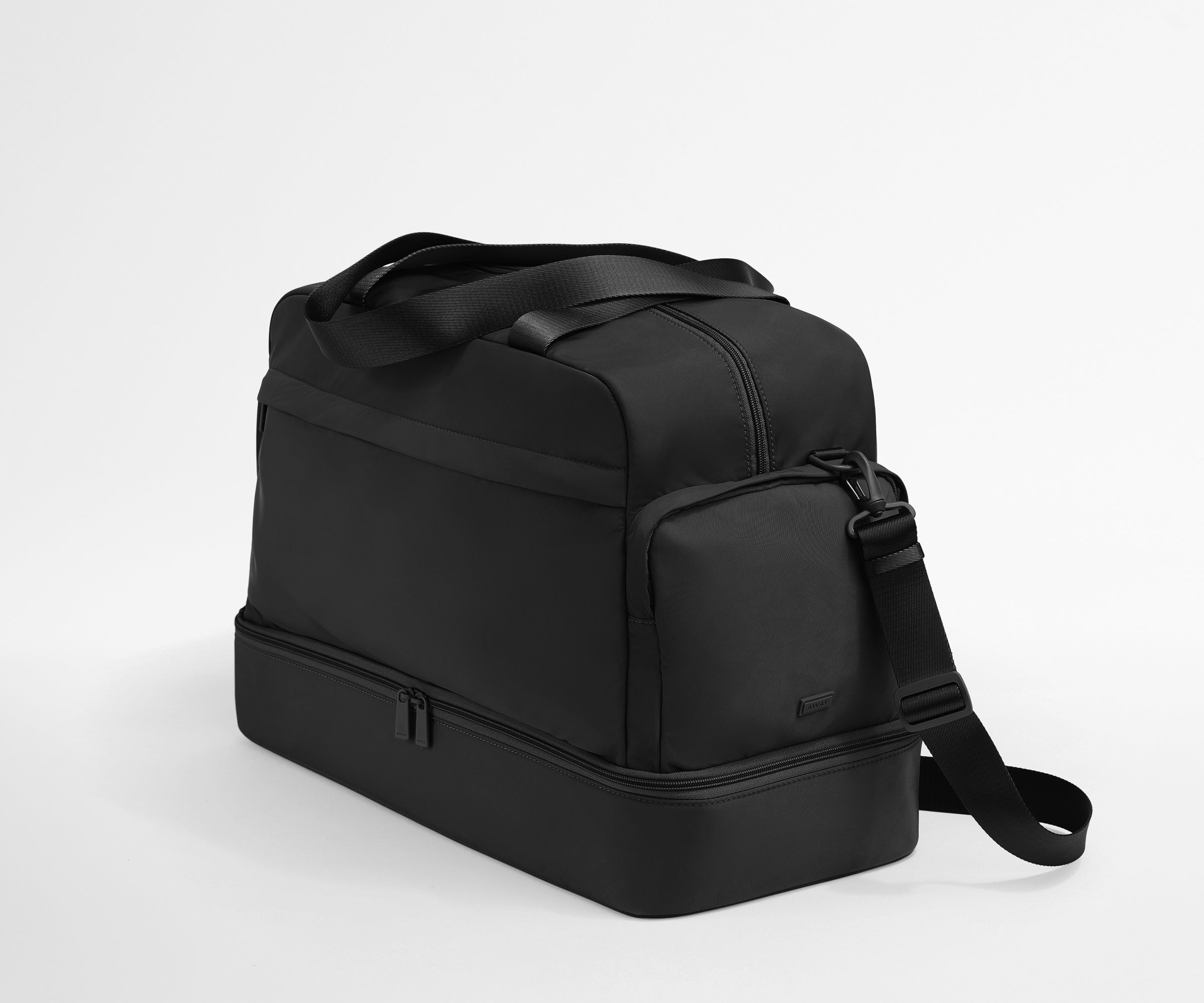 Angled view of the Featherlight Weekender showing the detachable strap and side pockets