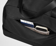 Front zipper pocket with phone and passport in their dedicated travel pockets