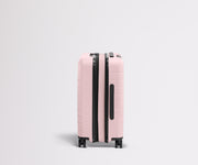 Side product view of The Carry-On Flex suitcase in Blush Pink shown fully expanded
