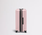 Side product view of The Large Flex suitcase shown fully expanded