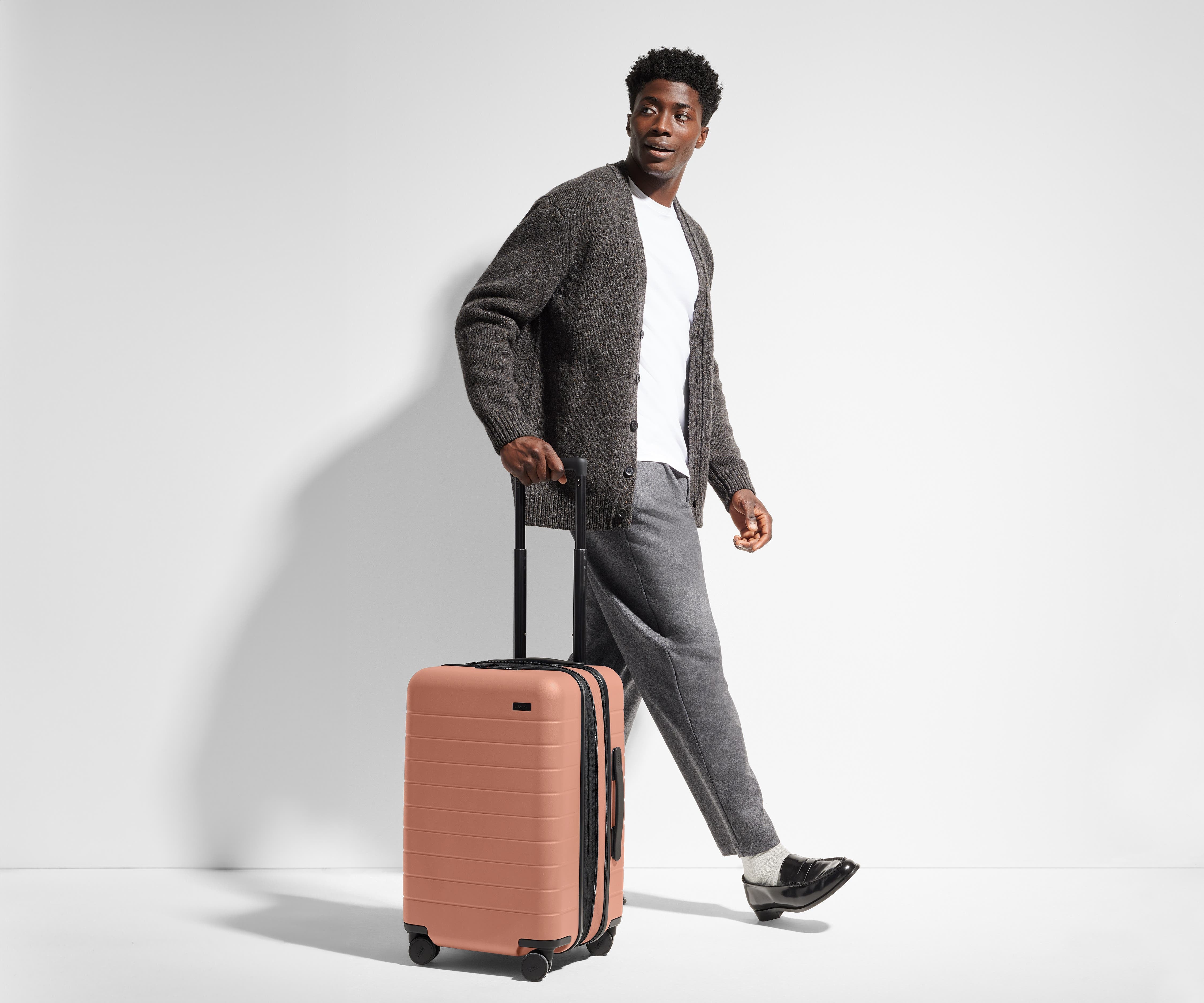 6'1" person walking with The Carry-On Flex