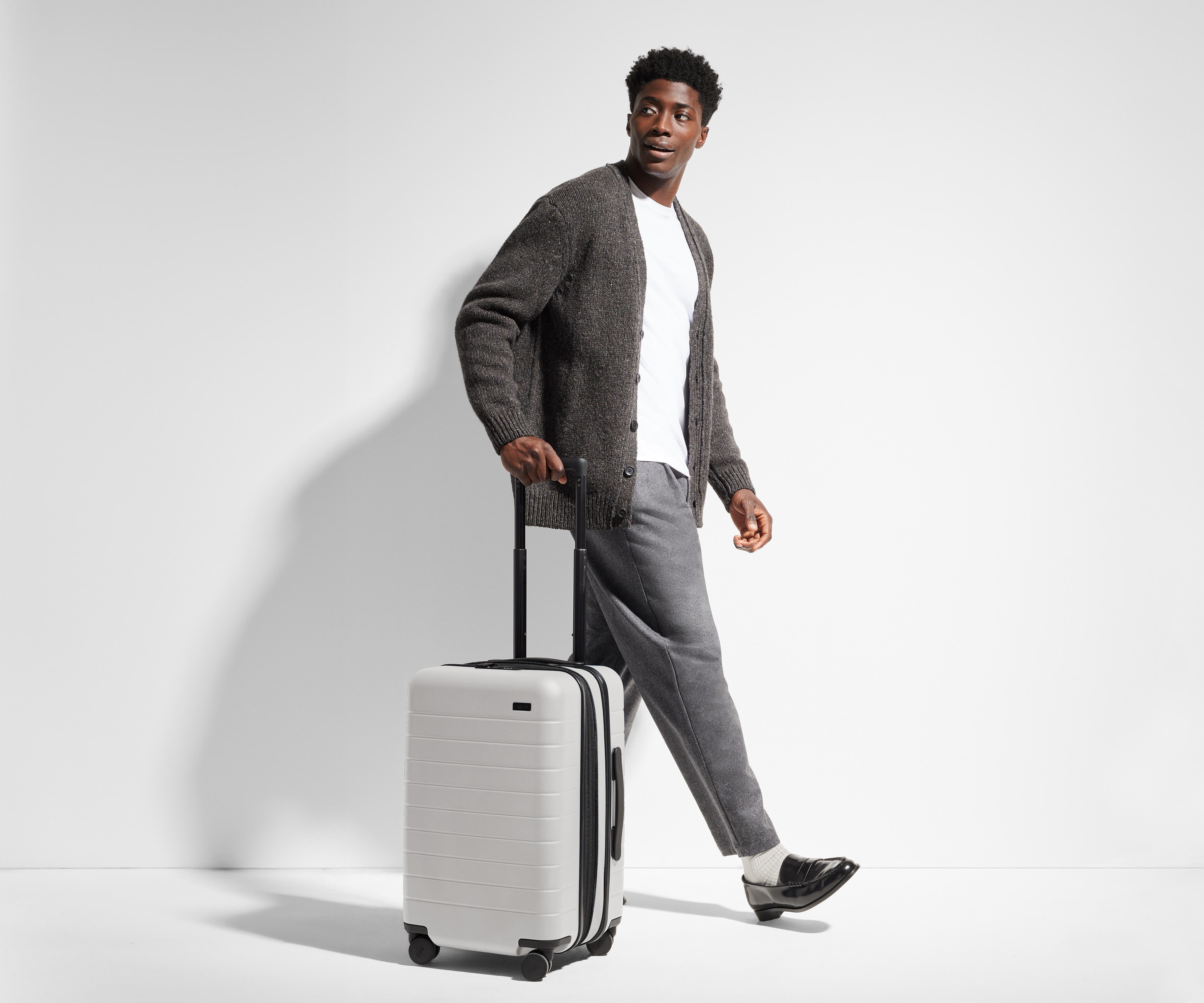6'1" person walking with The Carry-On Flex