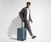 6'1" person walking with The Carry-On Flex