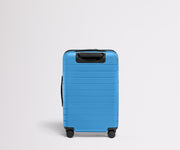 Back product view of The Bigger Carry-On Flex suitcase in Splash Blue
