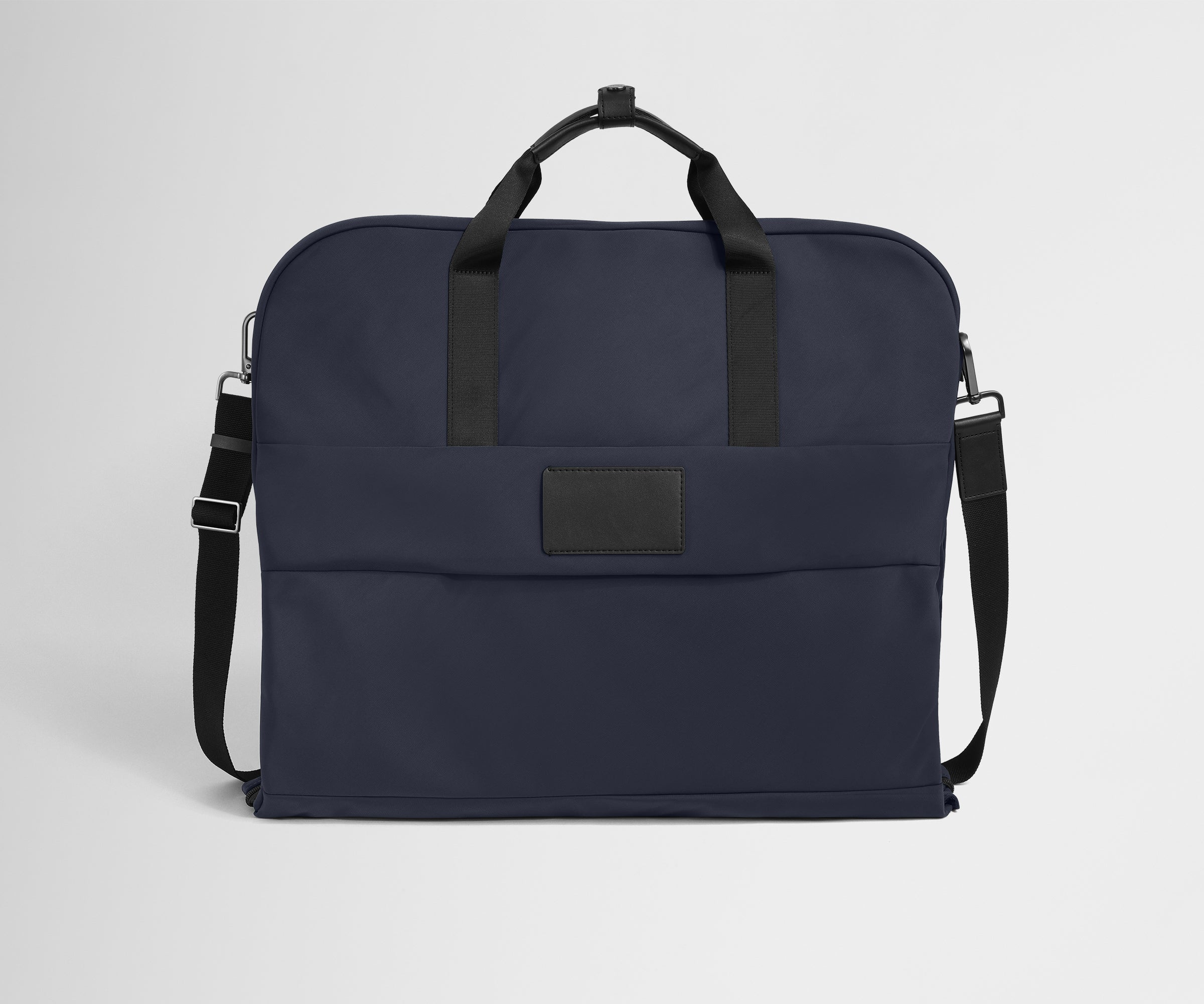 Back product view of the Garment Bag in Navy Blue with adjustable, removable shoulder strap attached